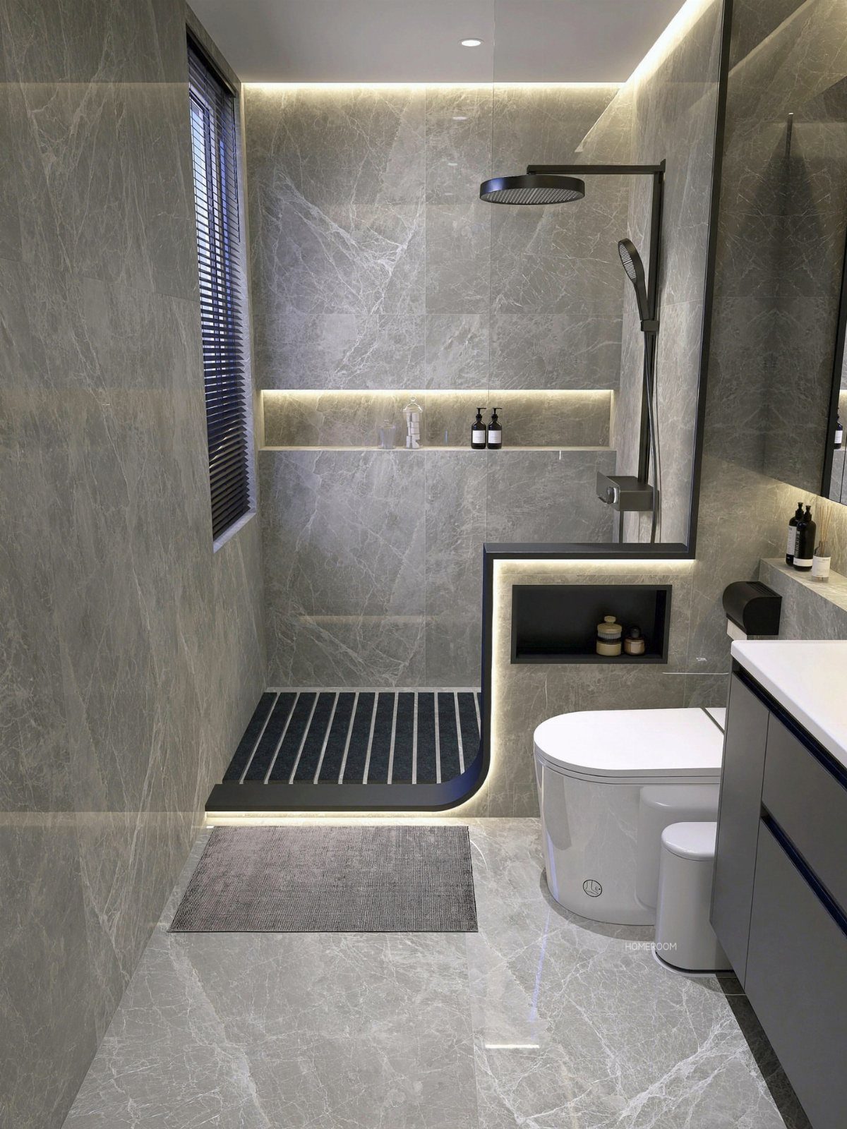 Modern grey marble bathroom with a walk-in shower and integrated LED lighting.