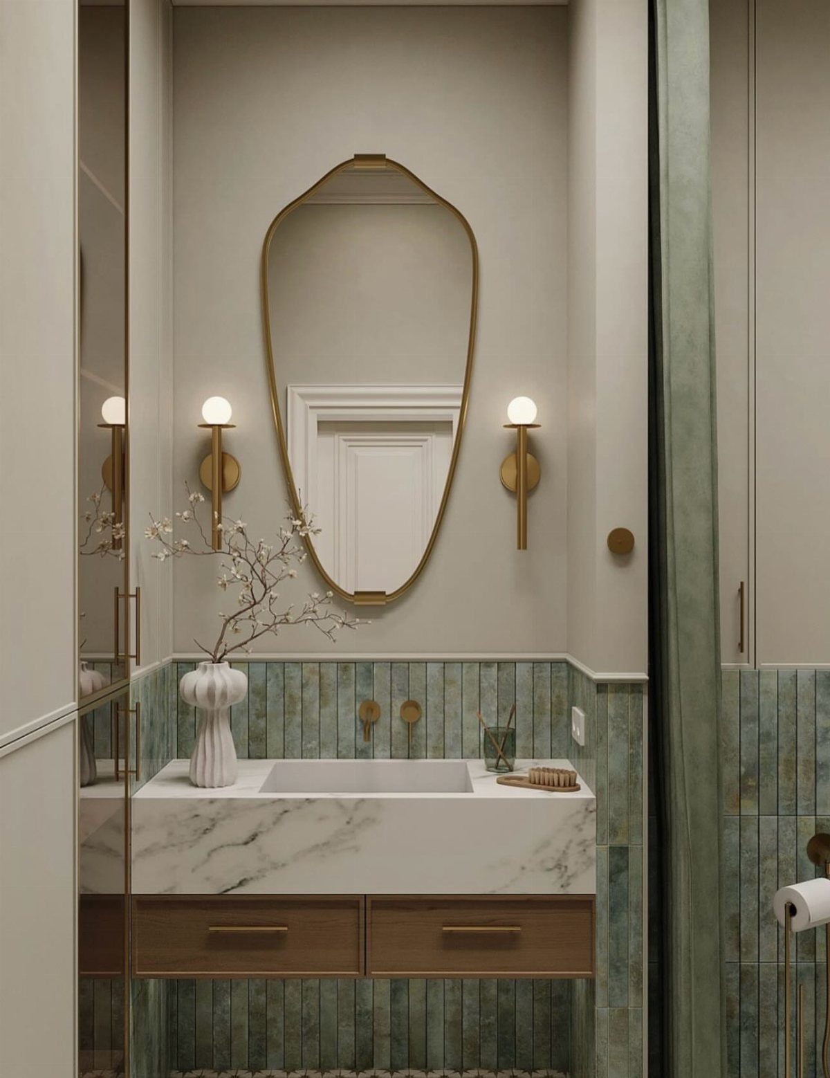 Bathroom with green half-height wall tiles, marble vanity, and oval gold mirror