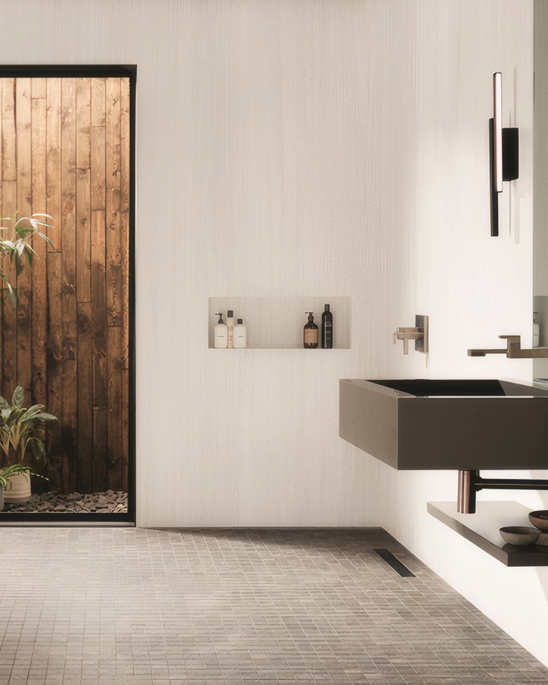 Grey rectangular floor tiles in a modern bathroom with a floating sink.