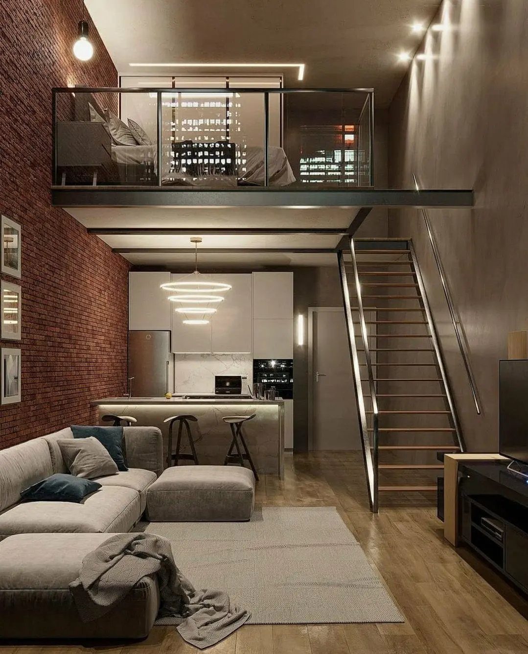 Modern loft apartment with red exposed brick walls, mezzanine level, and open floor plan.