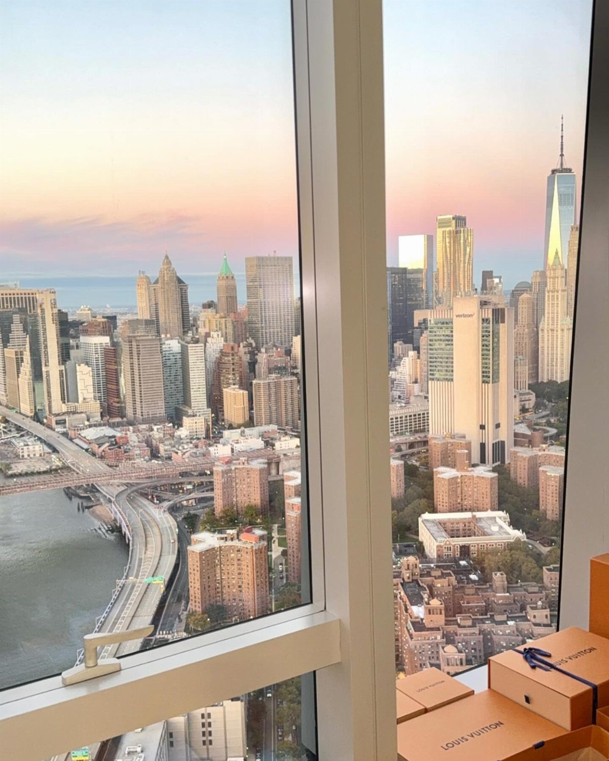 New York City skyline and Hudson River viewed through a high-rise apartment window