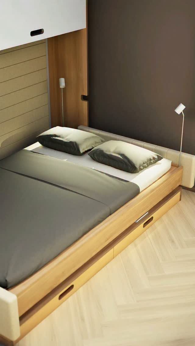 Wooden bed frame with integrated storage drawers and grey bedding in a modern room