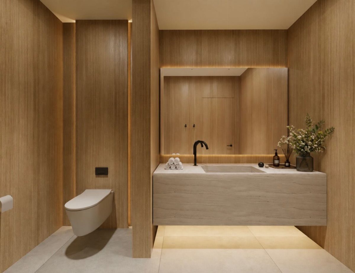 Modern powder room with wood walls, floating stone vanity, and warm recessed lighting.