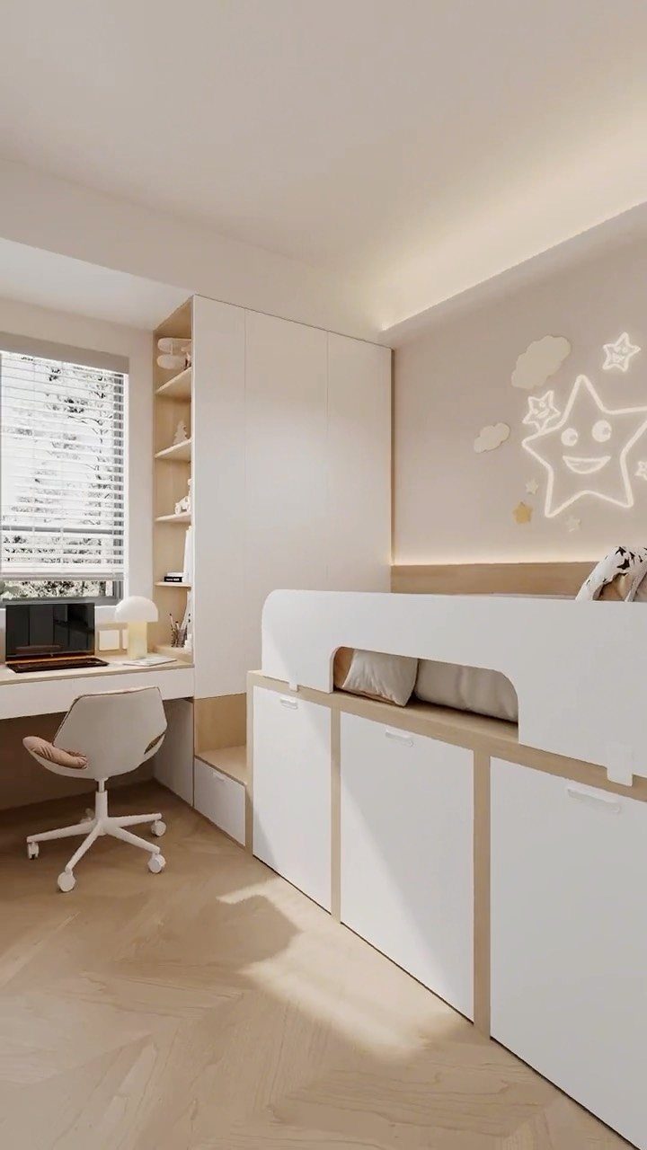 Loft bed with white storage cabinets underneath in a modern small bedroom.