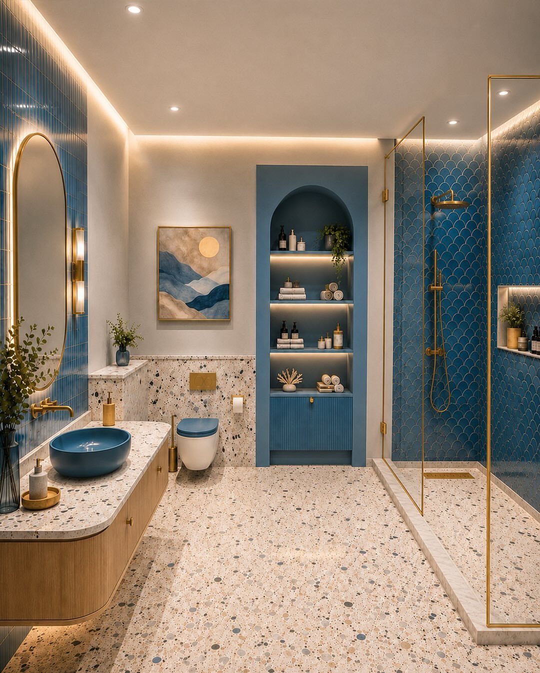 Modern bathroom with blue tiled walls, terrazzo floors, and a gold-framed shower.